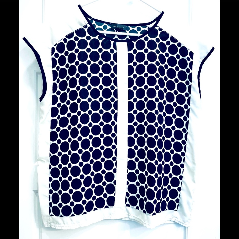 Medium 100% Polyester. White with Navy blue dots.